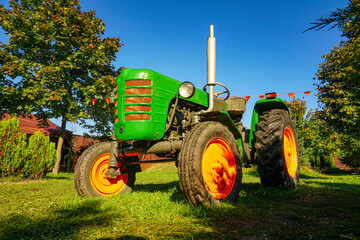 Old Farm retro Tractor in the garden