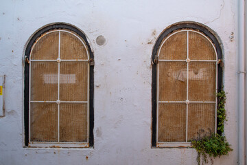 Old wooden window with shutters