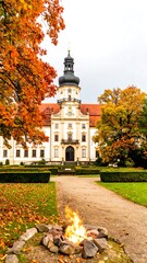 Autumnal castle with bonfire