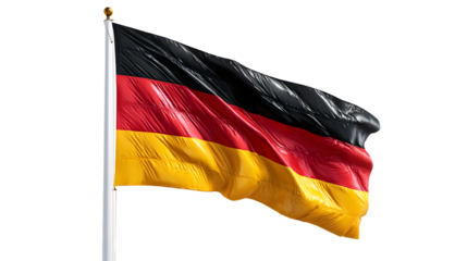 A german flag waving proudly on a white flagpole against a dark black background in the wind outdoors