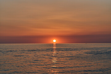 Serene Ocean Sunset with Vibrant Sky