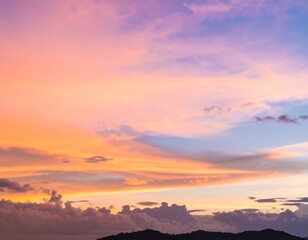 Naklejka premium Vibrant sunset sky with clouds