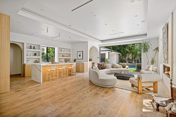 Stunning Indoor-Outdoor Estate with Lush Landscaping and Contemporary Finishes