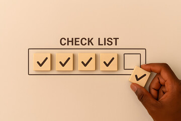 Completing the Checklist: A hand meticulously places the final checkmark, symbolizing completion and fulfilling a task, against a warm, inviting background.