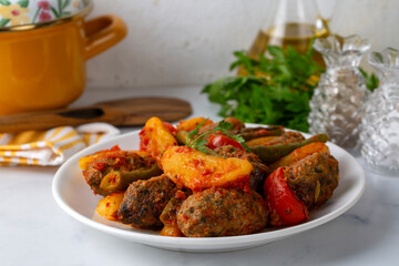 Traditional Homemade Turkish Food Kofte - Kofta with Tomato Sauce and Potatoes. (Turkish name;...