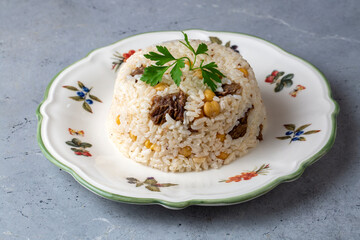 Traditional Turkish food; Roasted meat on rice (Turkish name; pilav üstü kavurma, kurban kavurma, nohutlu etli pilav)