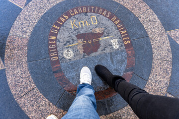Madrid Km. 0 Landmark: A unique perspective showcasing the heart of a bustling city through the Km. 0 landmark, with a map of the country etched into the pavement.