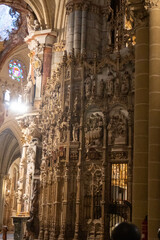 Intricate Architectural Detail Inside the Cathedral:  A mesmerizing view of the detailed interior of an age-old cathedral reveals the unique patterns, textures, and spiritual architecture.