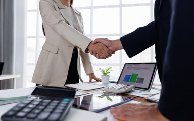 Business handshake for teamwork of business merger and acquisition,successful negotiate,hand...