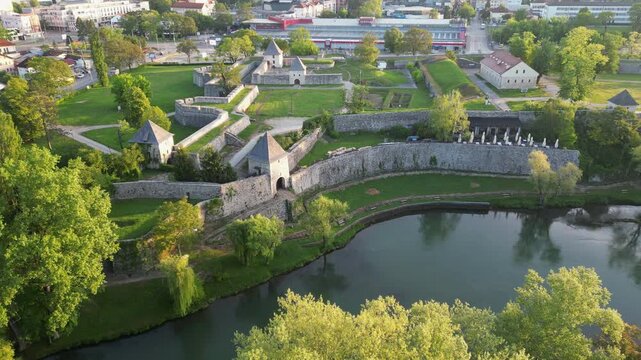 Aerial perspective of a medieval fortification located nex to the river Vrbas in Banja Luka, Republic of Srpska. Flying backwards.