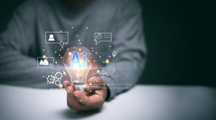 Artificial intelligence (AI) concept. Human hand holding glowing AI lightbulb. Innovative technology. Digital data connection and machine learning in modern business and communication.