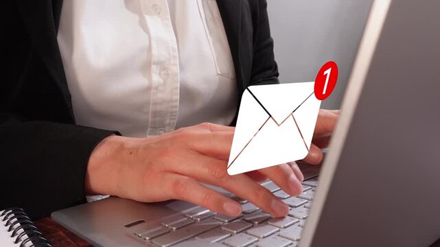 Email communication. Close-up of female hands in action on the keyboard, with an animation of an email envelope on the keyboard.
