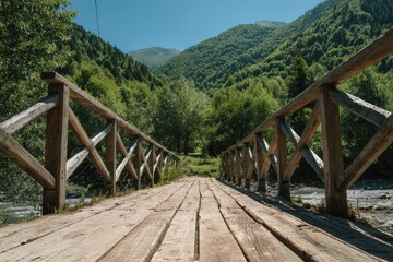 Obraz premium Wooden bridge through lush valley