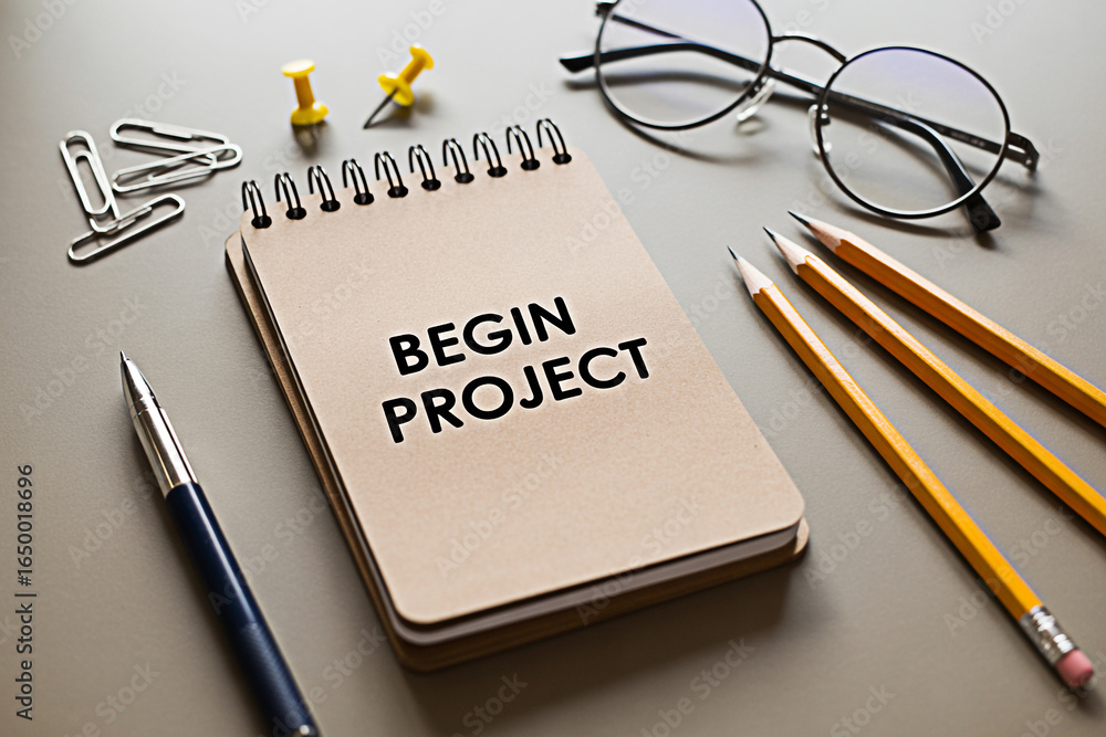 Poster begin project notebook concept with stationery for planning and organization on gray background flat