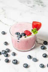 Freshly washed blueberries with water drops and a thick berry juice, textures to fall in love with
