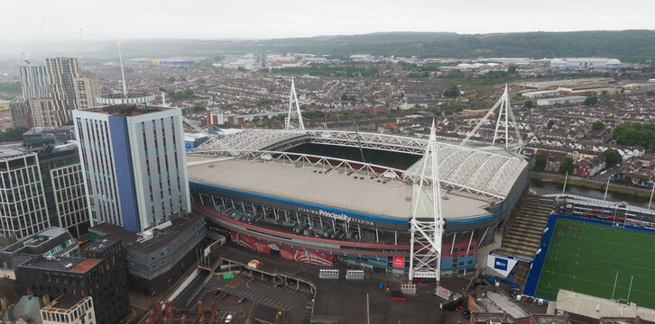 CARDIFF, UK - AUGUST 8, 2025 - Aerial view of the Principality Stadium in Cardiff, Wales, showcasing its iconic architecture amidst the cityscape on a cloudy day