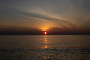 Beautiful sunset on the sea beach with coconut tree for travel in holiday