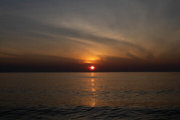 Beautiful sunset on the sea beach with coconut tree for travel in holiday