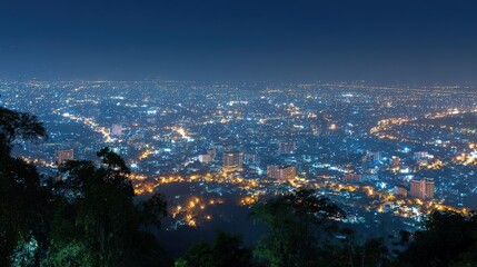 Obraz premium Night Cityscape View from Above with Glowing Lights