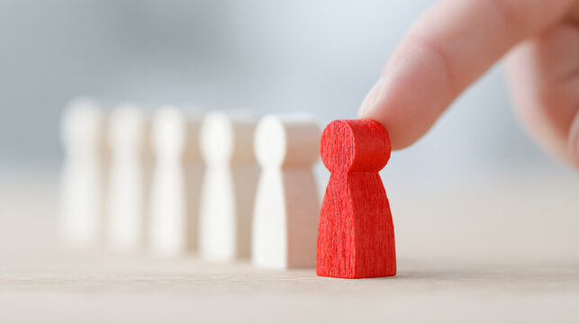 Red Wooden Figurines Leadership Teamwork Decision Business Strategy Success Influence Creativity Innovation Collaboration Unity Standing Out Difference Support Objectives Goals Competition Motivation