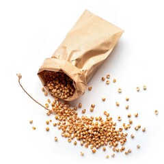 Light brown seeds spill from a paper bag