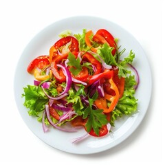 Colorful salad of sliced red and orange bell peppers, red onion, and lettuce on a white plate