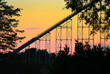 sunset over roller coaster