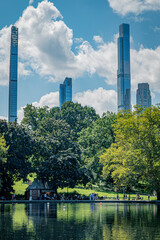 Urban Central Park Lake Reflection with City Skyscrapers and Trees
