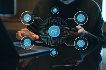 Businesswoman hand working digital marketing media in virtual screen with mobile phone and modern compute