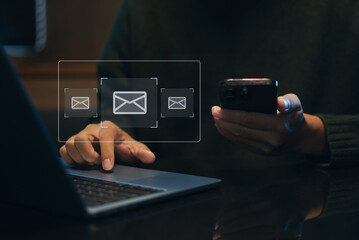 man in white suit taps email icon on virtual interface. Concept of digital communication, business...
