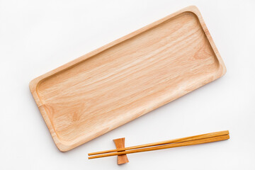 Empty sushi tray board on white background. Top view of plank wood for graphic stand product, interior design or montage display your product.