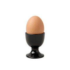 Elegant egg cup showcasing a single brown egg on a black background still life