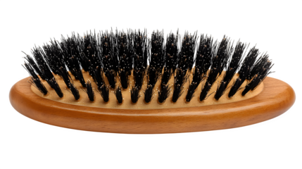 Elegant wooden hairbrush showcasing natural boar bristles for healthy, shiny hair and grooming