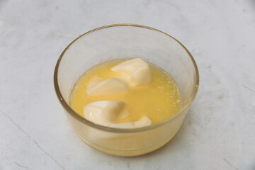Softened butter in a glass dish