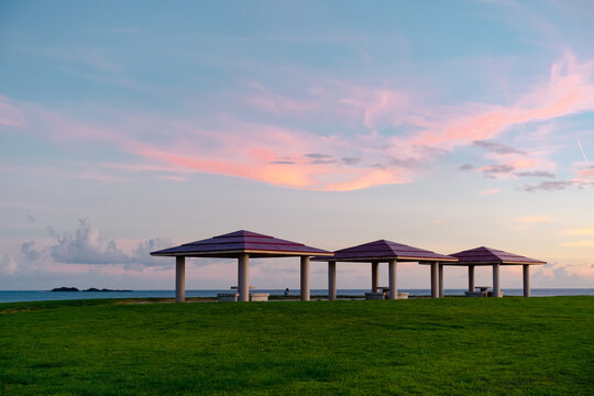 Gazebo on the beach in Okinawa with beautiful sky background at sunset
