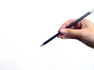 Hand holding a black pencil with a sharp tip against a white background. Minimalist concept for writing, drawing, education, creativity, or back-to-school themes.