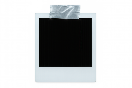 Close-up of an empty instant photo frame fixed with sticky tape on a transparent background, creating a vintage and customizable template
