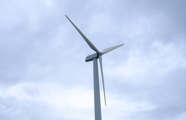 Fototapeta premium Wind farm on the mountain on blue sky day wind energy concept alternative energy Renewable energy