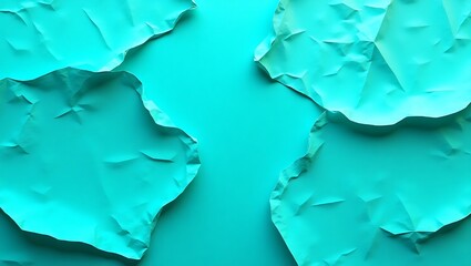 Arrangement of torn turquoise paper pieces on a matching background, flatlay style
