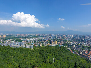 Aerial View of a Breathing Green City with Lush Parks and Waterways