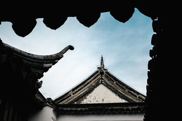 Stunning details of ancient Chinese temple architecture with elegant rooftop decorations