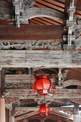 Architectural beauty of ancient Chinese temple with intricate roof decorations and lanterns