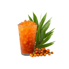 Refreshing Iced Sea Buckthorn Tea in a Disposable Cup with Tropical Leaves
