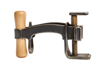 Vintage metal clamp with wooden handle.  Industrial,  robust,  tool.  Dark gray,  aged metal.  Two handles,  one wooden,  one metal.  Simple design,  functional