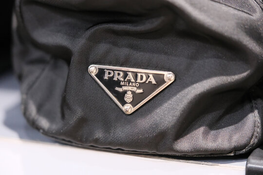 Shanghai,China-July 26th 2025: prada brand logo on bag