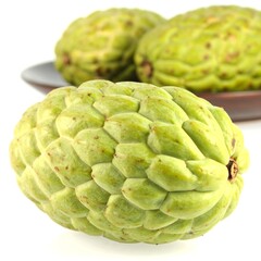 Obraz premium Fresh, green fruit with textured skin