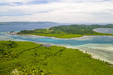 Scenic aerial panorama aerial drone picture of Siargao island with East Bucas Island and Bancuyo...