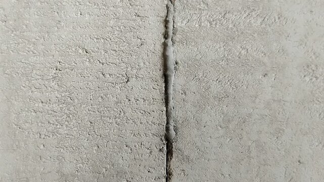 Lightweight concrete block wall with untidy mortar joints