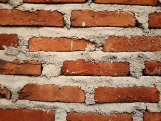 Brick texture on the house wall is suitable for background, red brick 