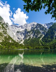 Mountain lake reflected in still water (1)